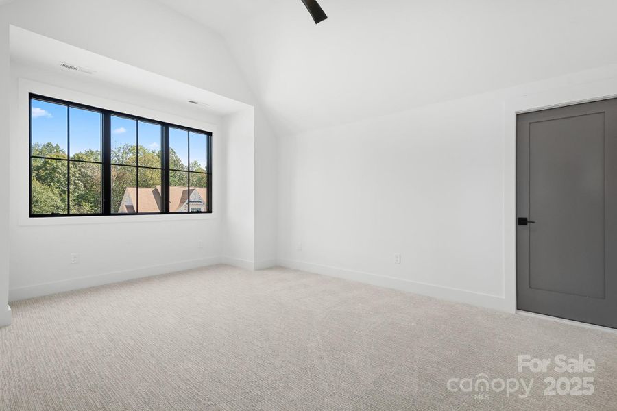 BR 2 with vaulted ceiling and private en suite