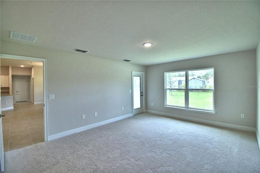 Spacious, unfurnished interior of a new home in Cadence Crossing, Auburndale (Image 55).