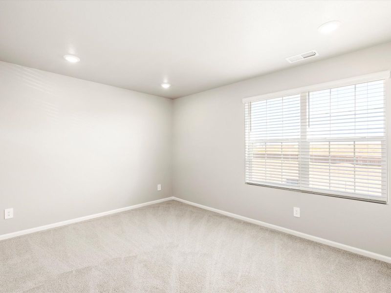 Spacious, unfurnished interior of a new home in Buffalo Highlands: The Flora Collection, Commerce City (Image 14).