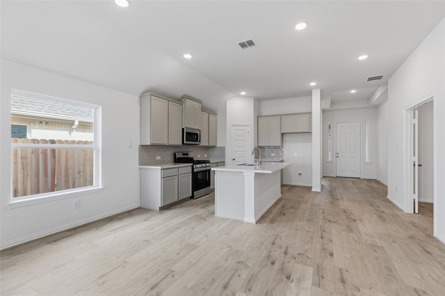 Furnished interior view inside a new home in Westland Ranch, League City (Image 6).