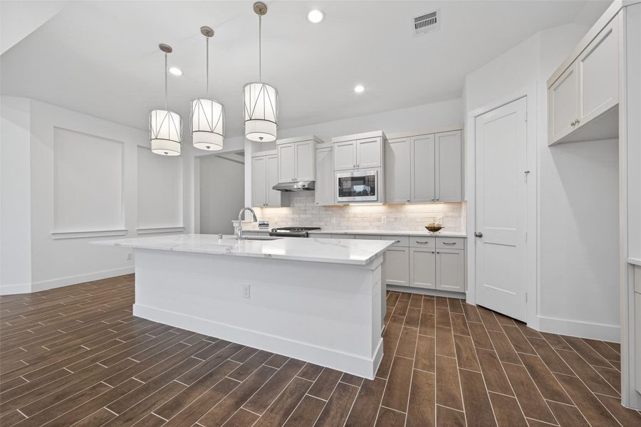 Furnished interior view inside a new home in Artavia, Conroe (Image 15).