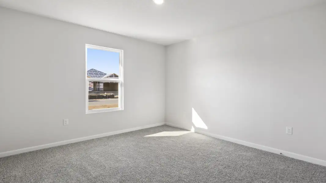 Spacious, unfurnished interior of a new home in Magnolia at the Bluffs Phase 3, Freeport (Image 12).