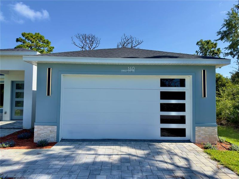 Front exterior of a new home in , Rotonda West, FL, highlighting curb appeal (Image 30). Front exterior of a new home in , Rotonda West, FL, highlighting curb appeal (Image 30).