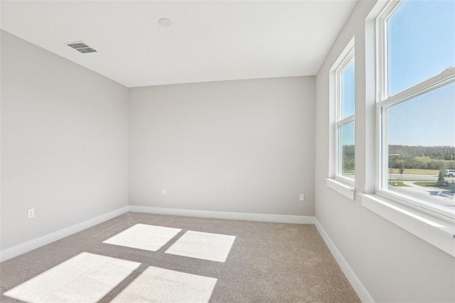 Spacious, unfurnished interior of a new home in Lagoon Residences at Epperson, Wesley Chapel (Image 33).