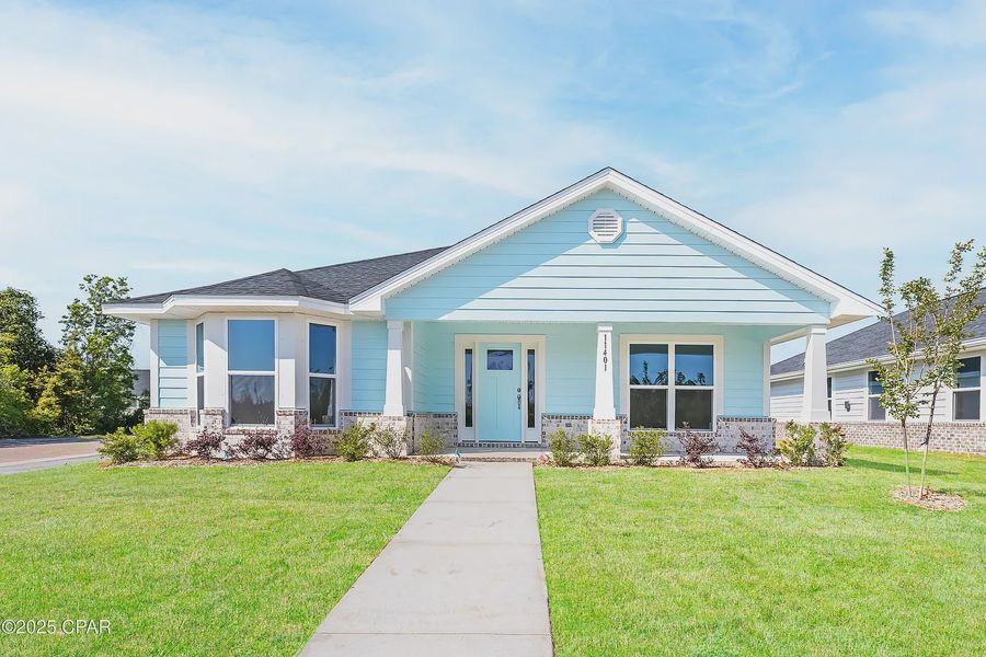 Representative exterior photo of a completed home built from the Plan 2101 by Adams Homes in The Bluffs at Lafayette, Freeport, FL (Image 15).