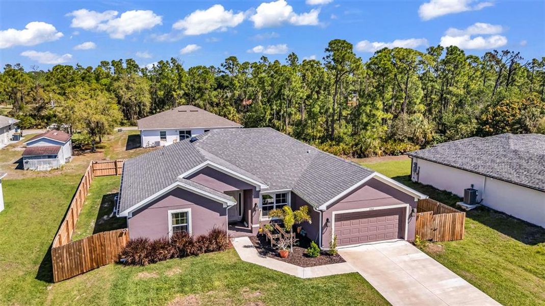Front exterior of a new home in , Punta Gorda, FL, highlighting curb appeal (Image 23).