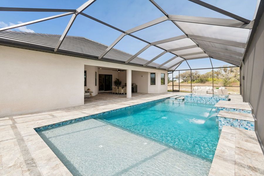 Exterior details and patio area of a home in River Preserve Estates, Parrish (Image 31).