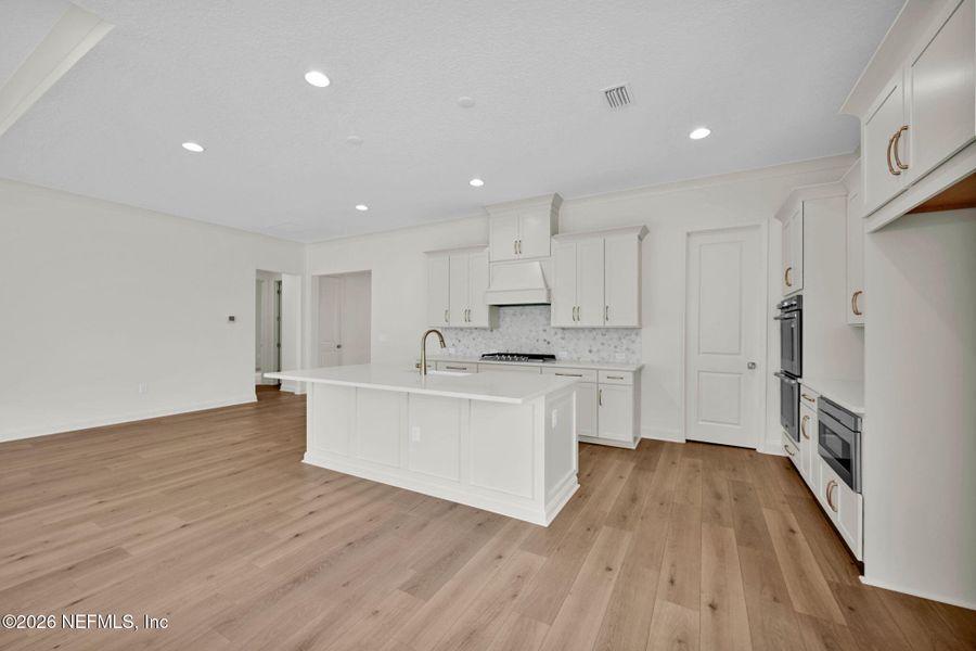 Furnished interior view inside a new home in Amelia National Country Club, Fernandina Beach (Image 7).