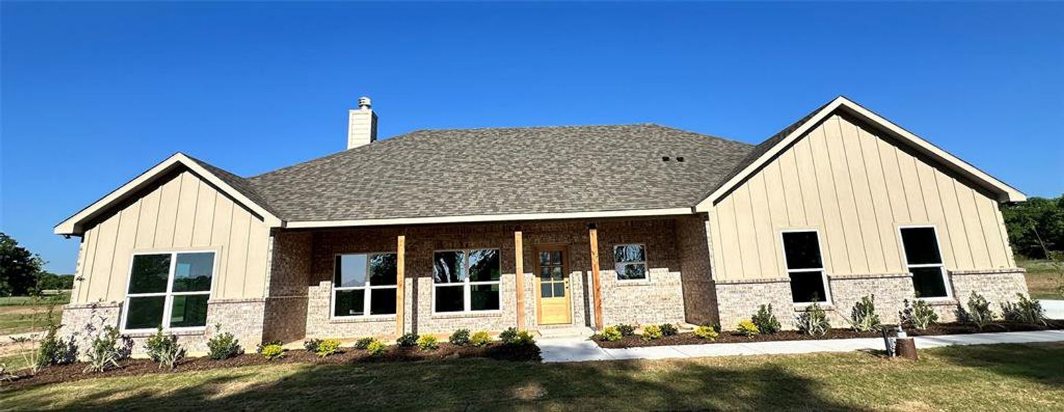 Front exterior of a new home in , Chico, TX, highlighting curb appeal (Image 2). Front exterior of a new home in , Chico, TX, highlighting curb appeal (Image 2).