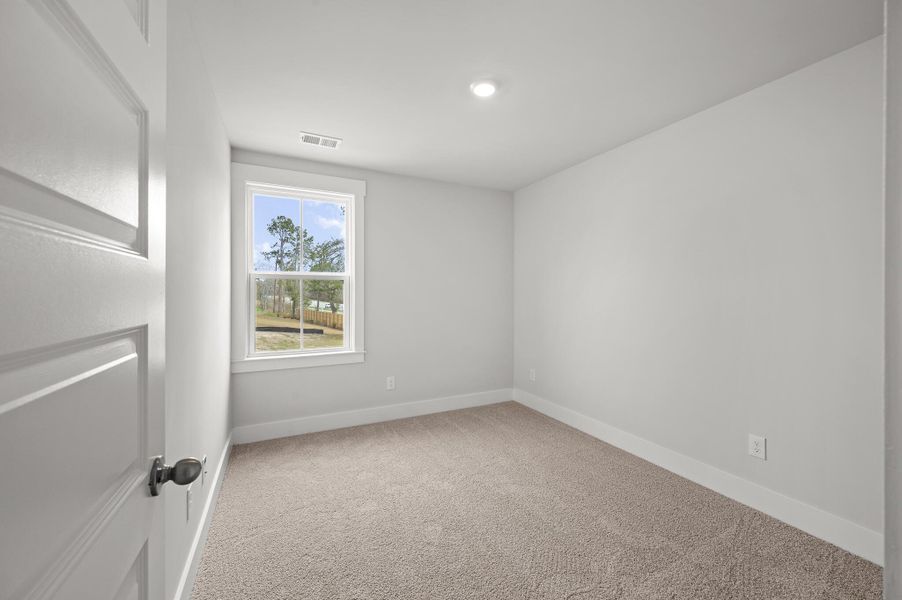 Photo is of a similar home