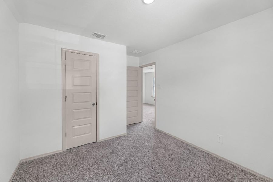 Spacious, unfurnished interior of a new home in Springwood, Beaumont (Image 21).