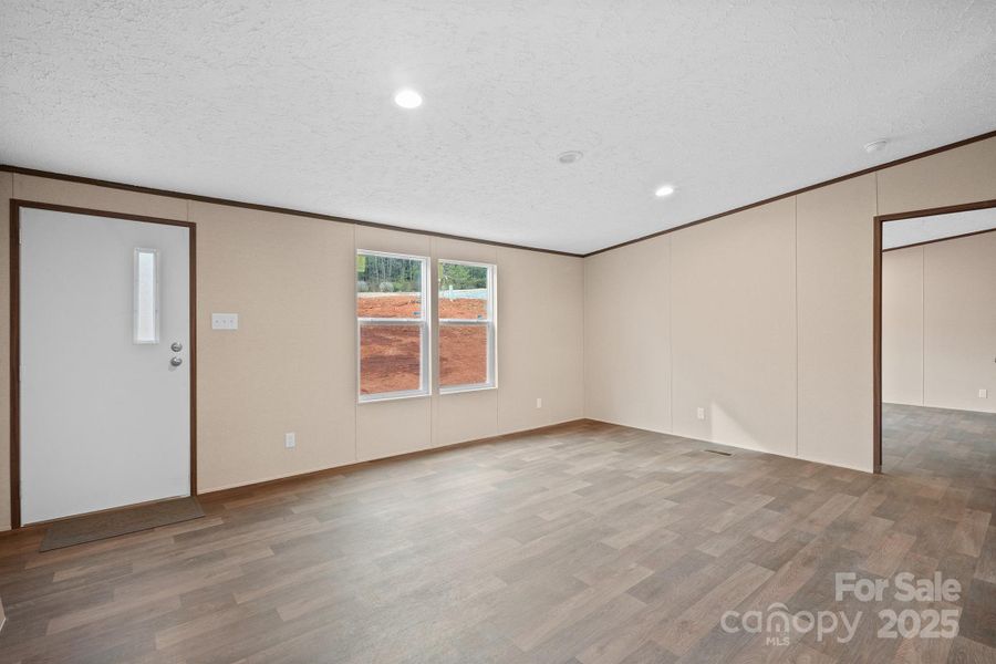 Spacious, unfurnished interior of a new home in , Lenoir (Image 14).