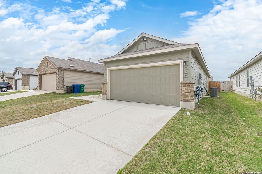 Front exterior of a new home in Willow Point, San Antonio, TX, highlighting curb appeal (Image 24).