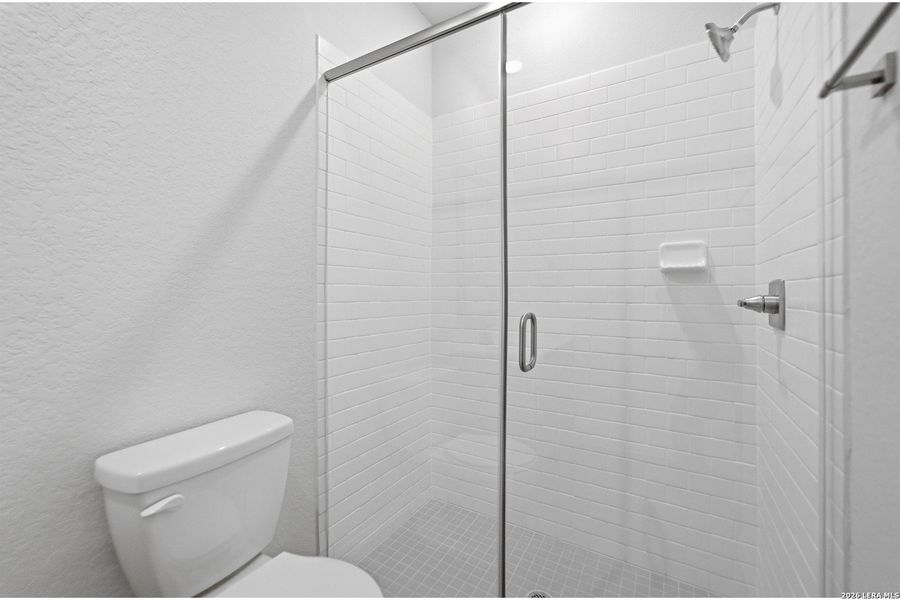 Furnished interior view inside a new home in The Woodlands at Medina Hills, Mico (Image 7).