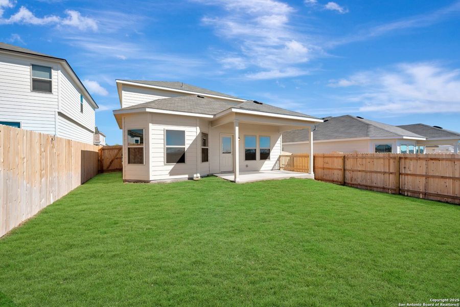 Exterior details and patio area of a home in Paloma Park, Converse (Image 23).