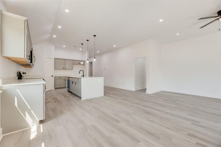 Open living, dining, kitchen