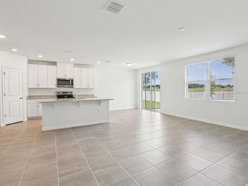 Spacious, unfurnished interior of a new home in The Reserve at Van Oaks, Auburndale (Image 19).