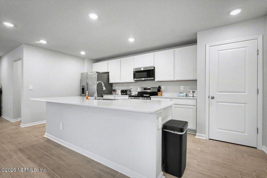Furnished interior view inside a new home in Kings Landing, Jacksonville (Image 12).