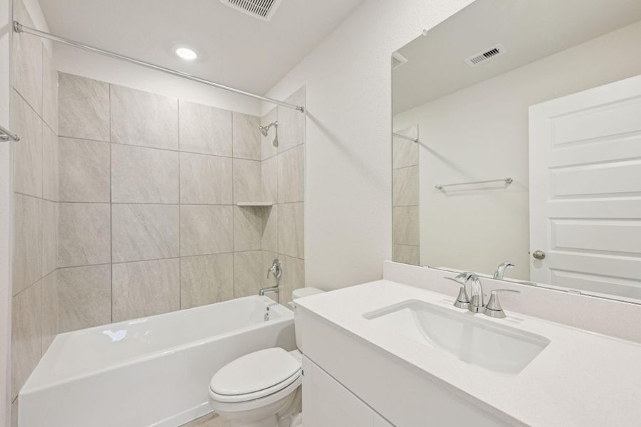 Furnished interior view inside a new home in Landing Meadows - Traditional Series, New Caney (Image 9). Furnished interior view inside a new home in Landing Meadows - Traditional Series, New Caney (Image 9).