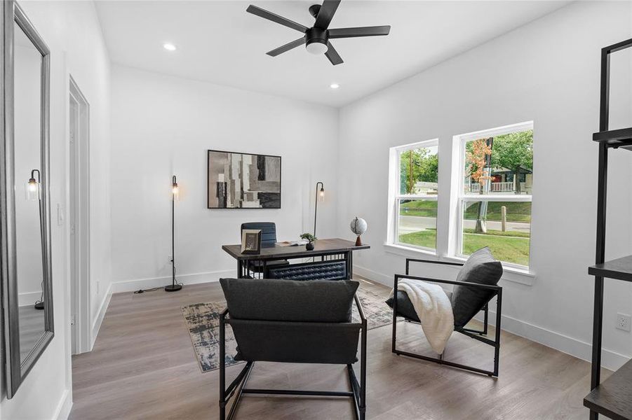 Home office with light wood-type flooring, recessed lighting, and a ceiling fan Home office with light wood-type flooring, recessed lighting, and a ceiling fan