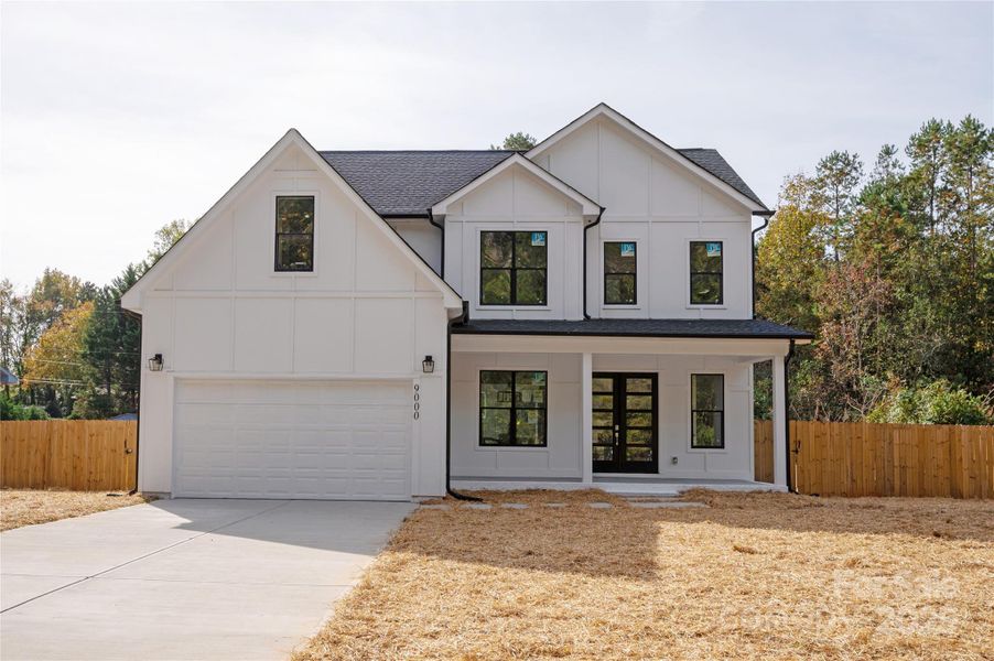 Front exterior of a new home in , Matthews, NC, highlighting curb appeal (Image 23).