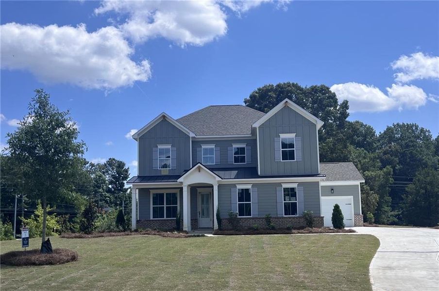 Front exterior of a new home in Oak Valley Estates, Marietta, GA, highlighting curb appeal (Image 1). Front exterior of a new home in Oak Valley Estates, Marietta, GA, highlighting curb appeal (Image 1).