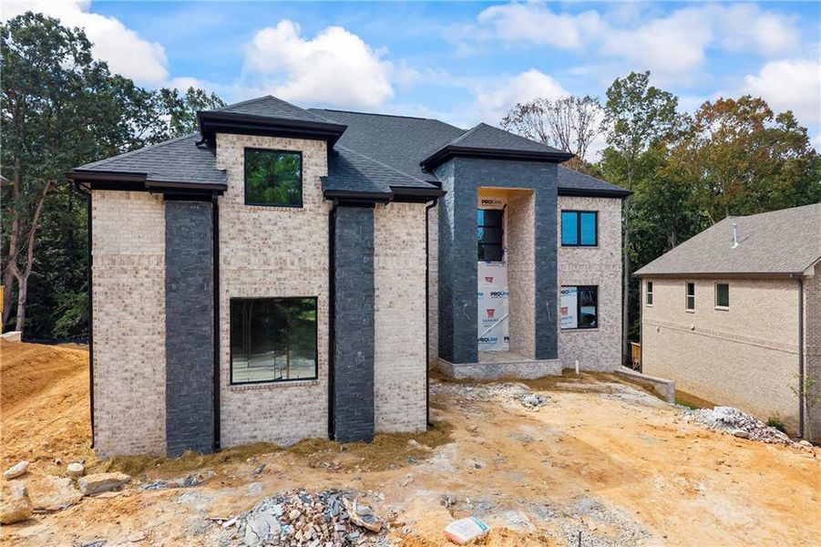 Front exterior of a new home in , Fairburn, GA, highlighting curb appeal (Image 17).