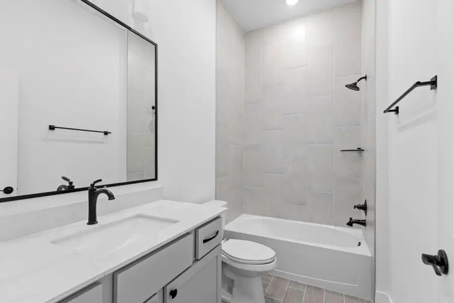 Furnished interior view inside a new home in Bridgeland, Cypress (Image 7).