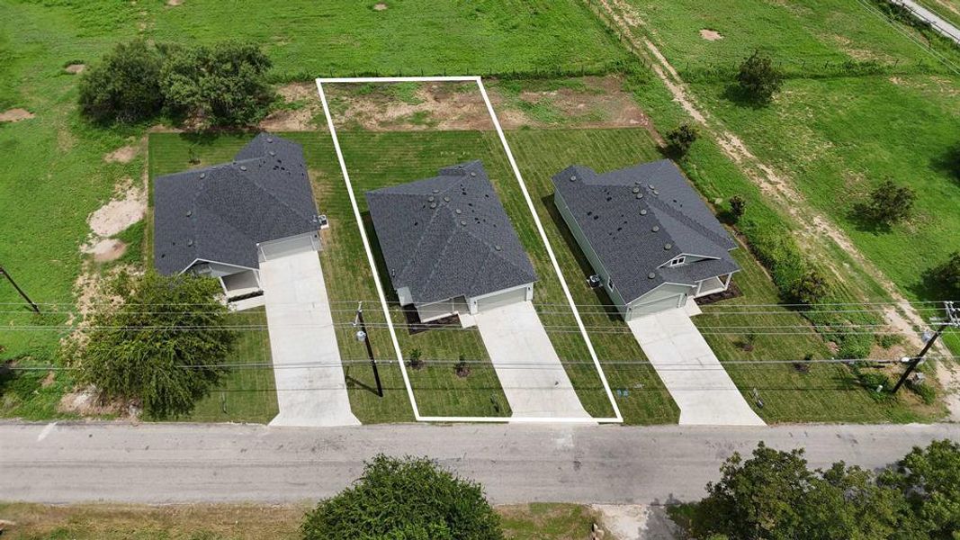 Front exterior of a new home in , Marble Falls, TX, highlighting curb appeal (Image 19).