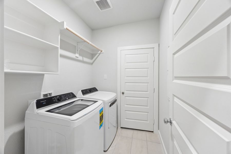 Utility Room in the Cedar home plan by Trophy Signature Homes – REPRESENTATIVE PHOTO