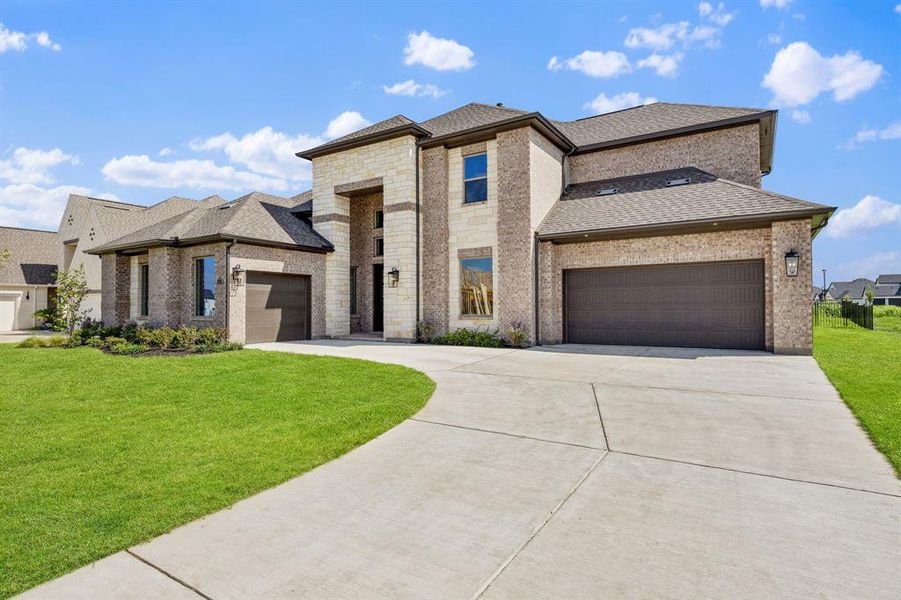 Front exterior of a new home in Heath Golf and Yacht Club, Heath, TX, highlighting curb appeal (Image 2). Front exterior of a new home in Heath Golf and Yacht Club, Heath, TX, highlighting curb appeal (Image 2).