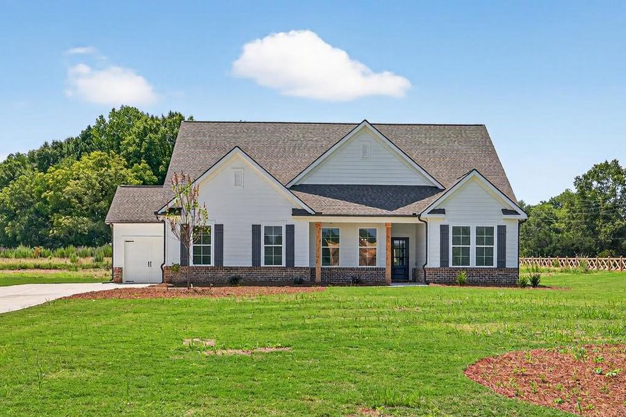 Front exterior of a new home in , Good Hope, GA, highlighting curb appeal (Image 2). Front exterior of a new home in , Good Hope, GA, highlighting curb appeal (Image 2).