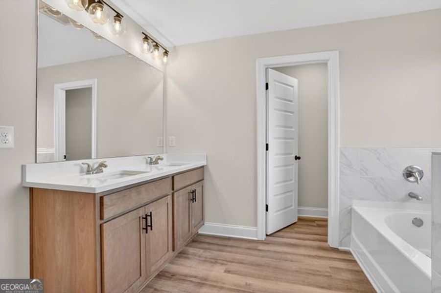 Furnished interior view inside a new home in Stone Brooke, Gray (Image 12).