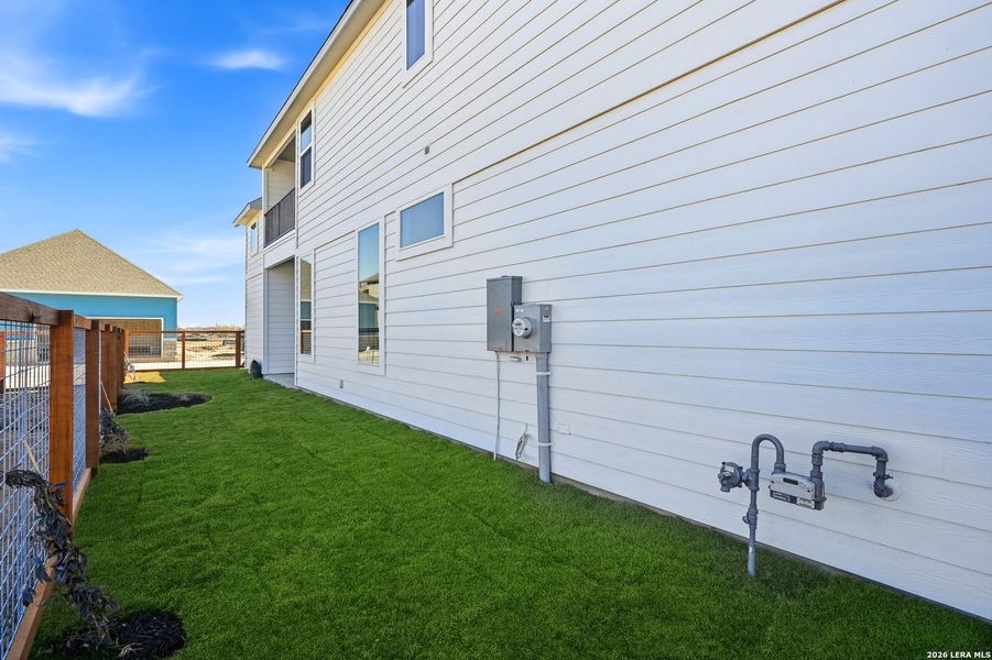 Exterior details and patio area of a home in The Crossvine, Schertz (Image 27).