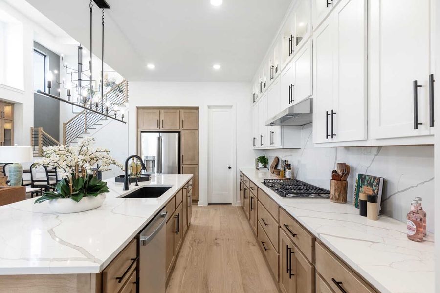 Representative furnished interior of a home built from the Fordham Plan by Highland Homes in Wellington: Artisan Series - 50ft lots, Fort Worth (Image 10).