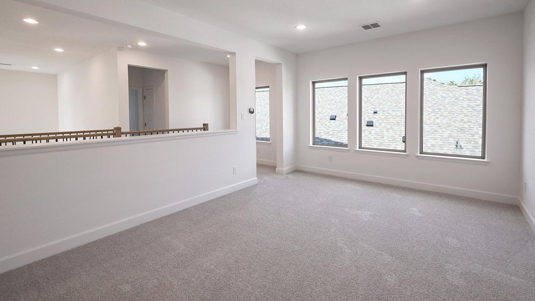 Spacious, unfurnished interior of a new home in 6 Creeks, Kyle (Image 16).