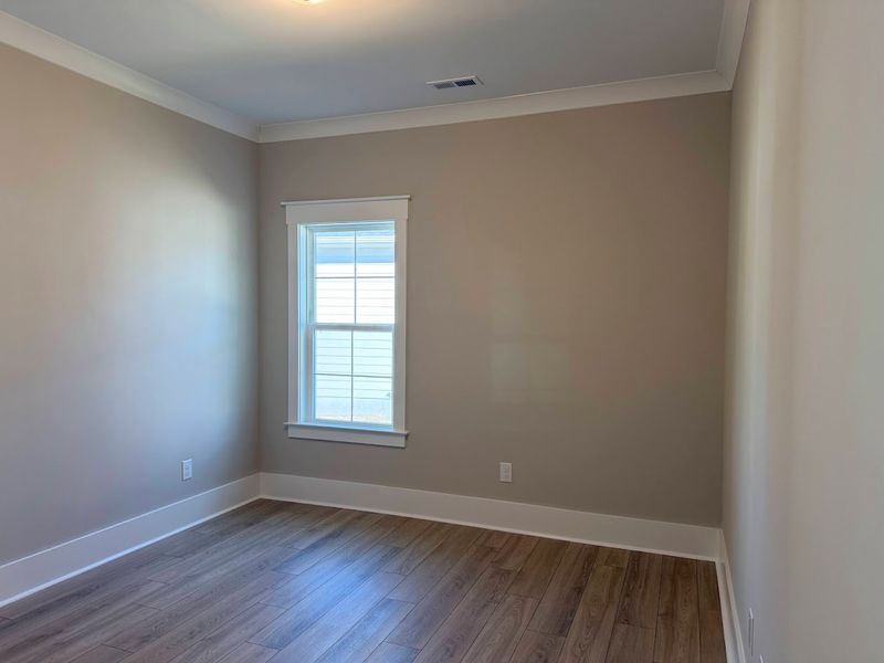 Spacious, unfurnished interior of a new home in Osprey Landing, Southport (Image 19).