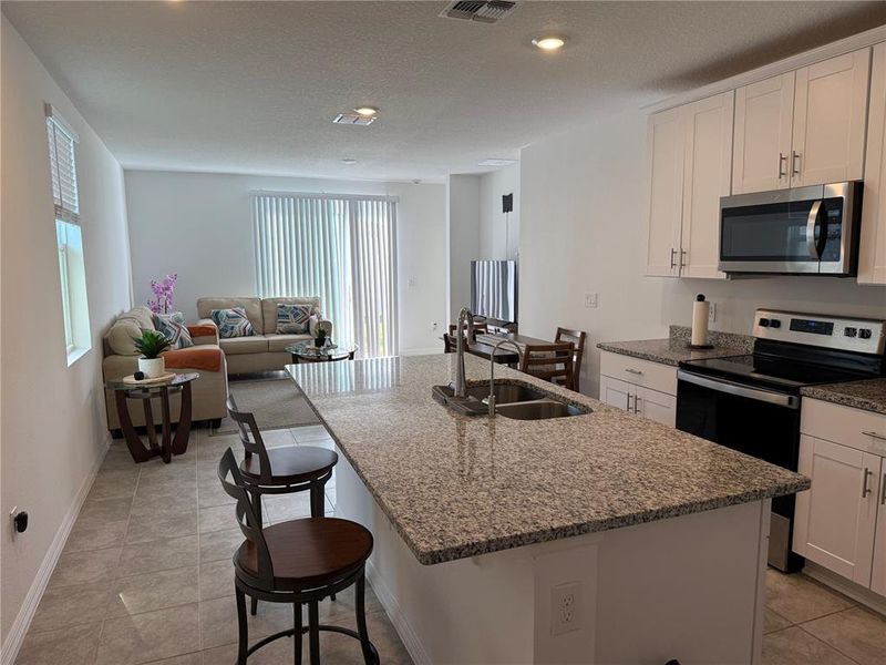 Furnished interior view inside a new home in , Haines City (Image 6). Furnished interior view inside a new home in , Haines City (Image 6).