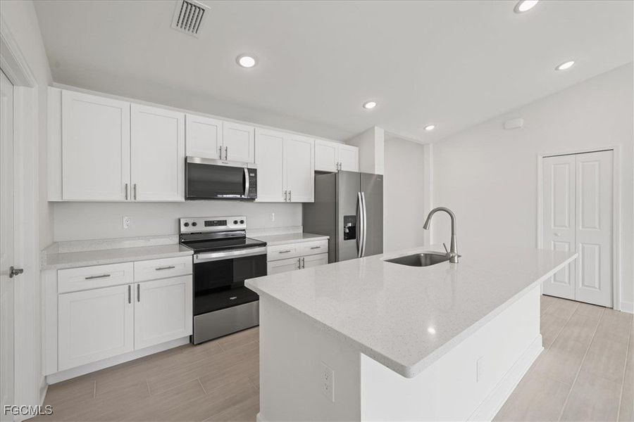 Furnished interior view inside a new home in Cape Coral, Cape Coral (Image 6). Furnished interior view inside a new home in Cape Coral, Cape Coral (Image 6).