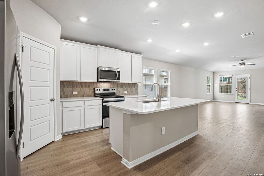 Furnished interior view inside a new home in Legendary Trails - Premier Series, Cibolo (Image 8).