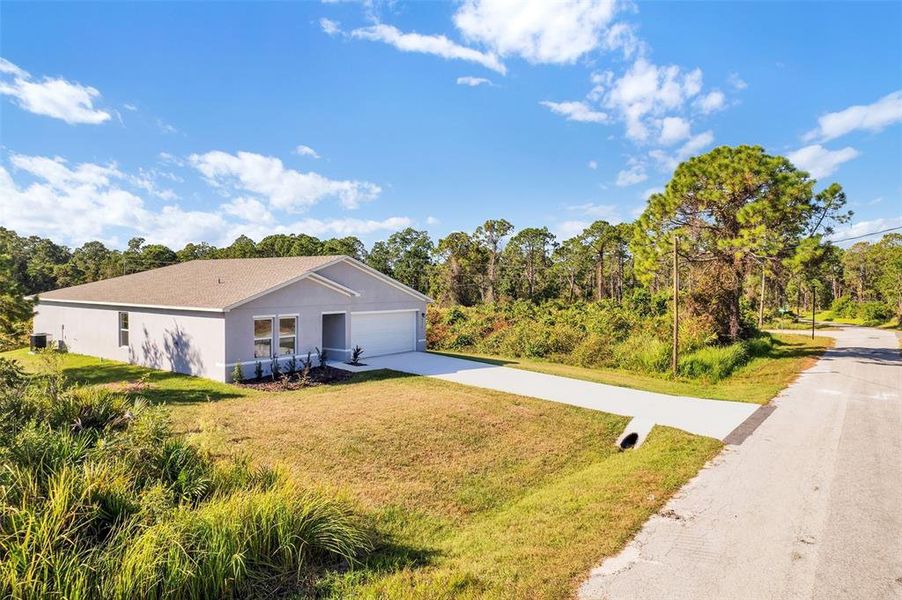Front exterior of a new home in Sebring Classic, Sebring, FL, highlighting curb appeal (Image 6).