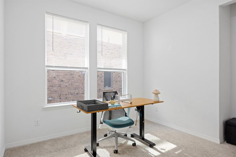 Office with light colored carpet Office with light colored carpet