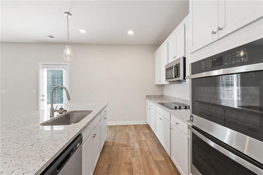 Furnished interior view inside a new home in Fern Dale, Fairburn (Image 7).