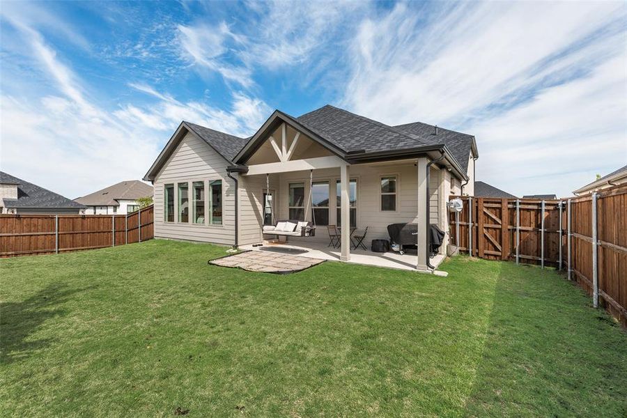 Exterior details and patio area of a home in Devonshire, Forney (Image 21).