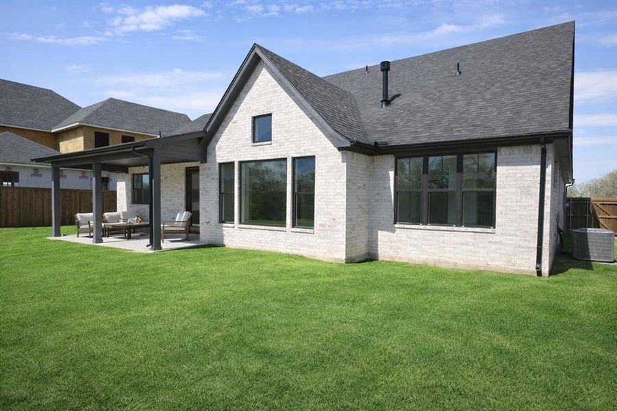 Exterior details and patio area of a home in , Pottsboro (Image 3).