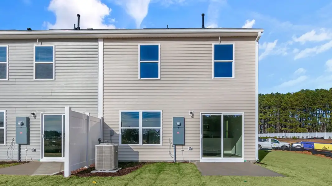 Exterior details and patio area of a home in The Townes at Honeycutt Oaks, Angier (Image 4).