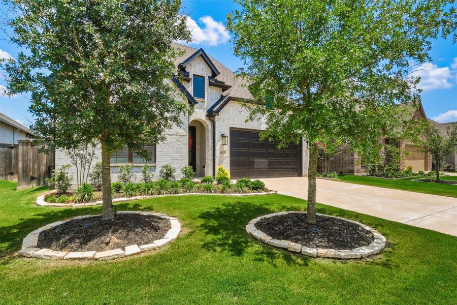 Front exterior of a new home in , Brookshire, TX, highlighting curb appeal (Image 24).