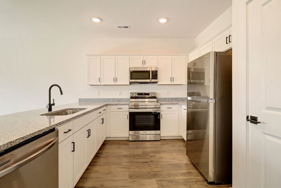 Furnished interior view inside a new home in Westgate Village Townes, Spartanburg (Image 2).