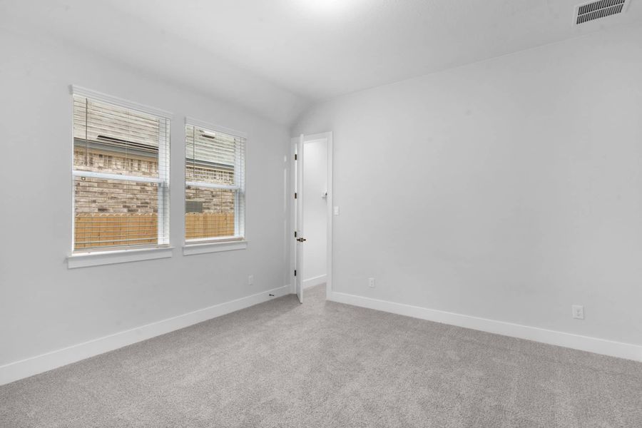 Spacious, unfurnished interior of a new home in The Grove at Blackhawk, Pflugerville (Image 30).