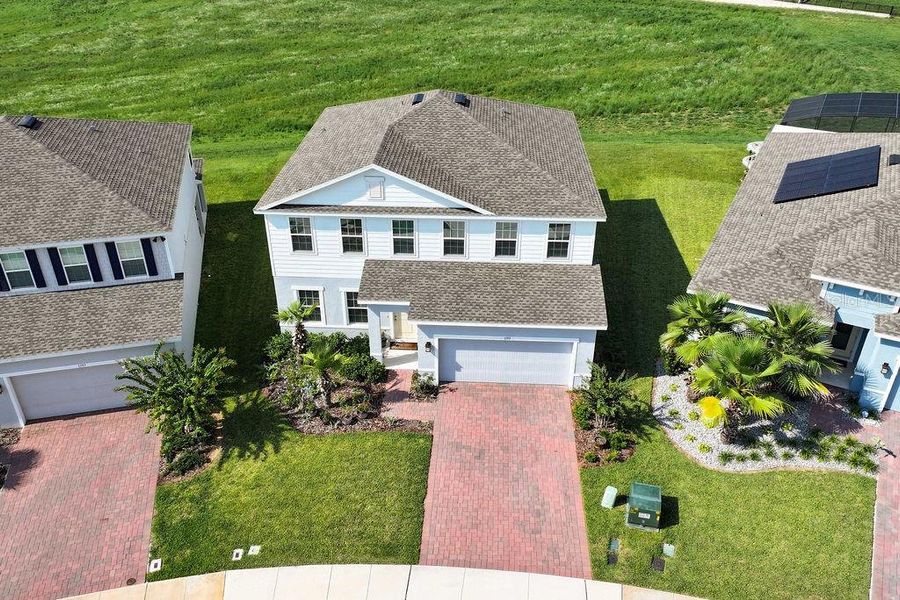Front exterior of a new home in , Minneola, FL, highlighting curb appeal (Image 27). Front exterior of a new home in , Minneola, FL, highlighting curb appeal (Image 27).